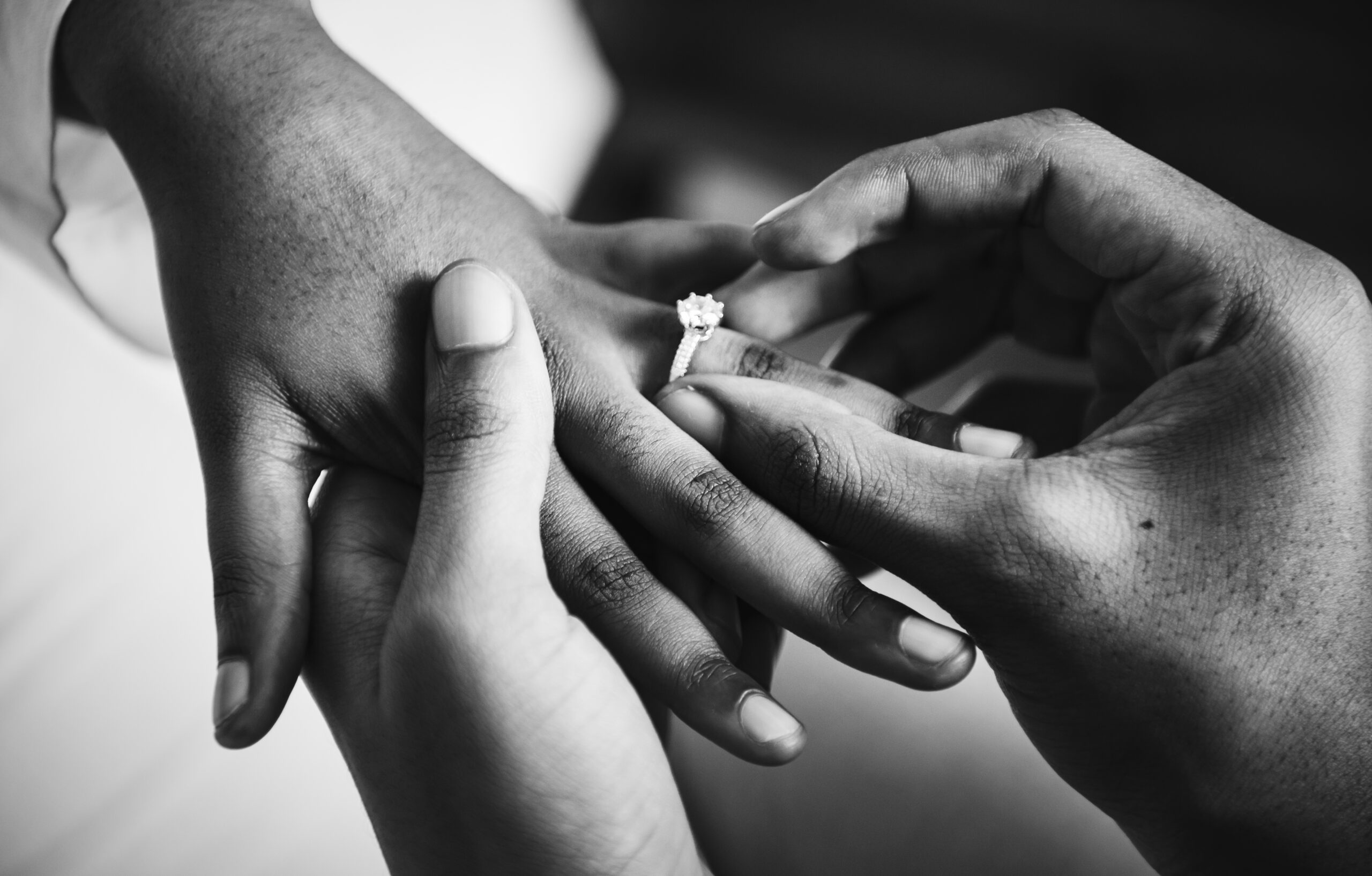 Couple exchanging wedding rings during civil marriage ceremony in Uganda